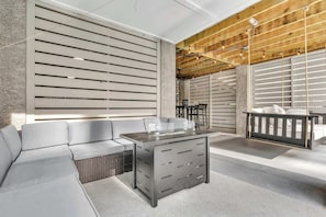 Head downstairs to the lower-level patio & unwind in the fresh air