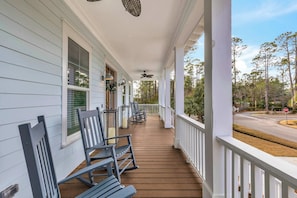 Sip morning coffee or an evening cocktail on the breezy front porch