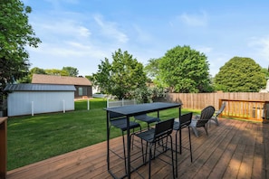 Lounge the day away or dine alfresco on the sunny back deck