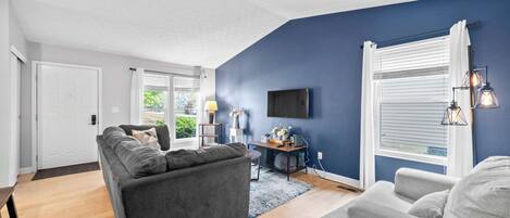 Curl up in the serene living room & stream your favorites on the smart TV