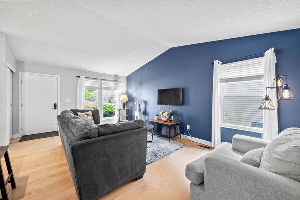 Curl up in the serene living room & stream your favorites on the smart TV