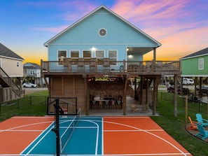 Your private resort: pickleball court, tiki bar, and firepit—just steps from your front door.