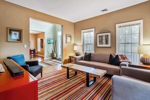 Bright, comfy living room to unwind after exploring