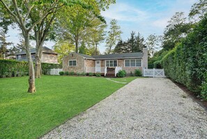 Front view and driveway of the home