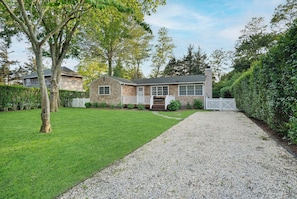 Front view and driveway of the home