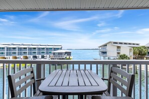 Your own private deck overlooking the inlet and Gulf