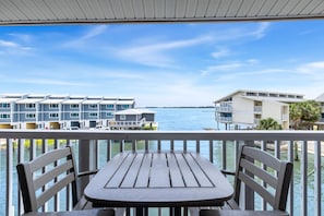 Your own private deck overlooking the inlet and Gulf