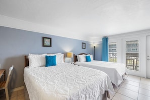 Two queen beds in this well appointed studio condo in downtown Cedar Key