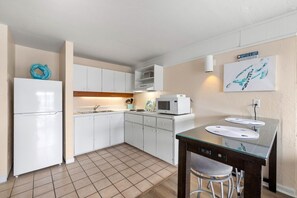 Kitchen with stove top burners (no oven)