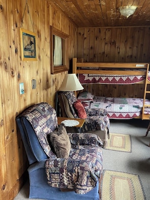 Located on sunporch, off the living room. facing Brandy Pond.