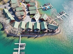 Bird’s-eye view of our 3-story chalet showcasing three private decks that lead directly to the lake, along with a lighted walking path that winds through the exclusive Harbour Point community.