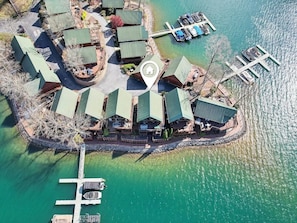 Bird’s-eye view of our 3-story chalet showcasing three private decks that lead directly to the lake, along with a lighted walking path that winds through the exclusive Harbour Point community.
