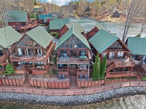 View front and center of our Chalet's back deck areas. Stair access connects all 3 levels inside and outside to the lower levels for quick water access