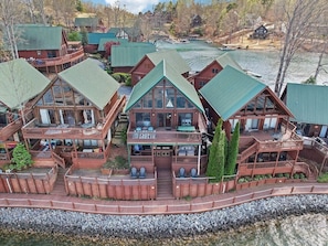 View front and center of our Chalet's back deck areas. Stair access connects all 3 levels inside and outside to the lower levels for quick water access