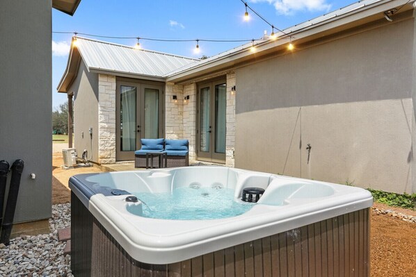 Unwind in your private hot tub with nothing but sky above and quiet all around