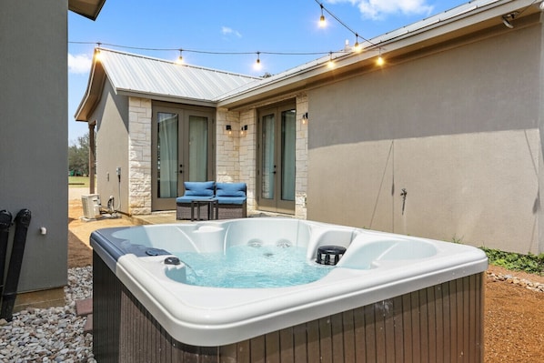 Unwind in your private hot tub with nothing but sky above and quiet all around