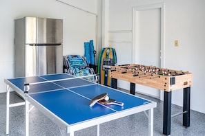 Plenty of games and beach equipment in the garage.