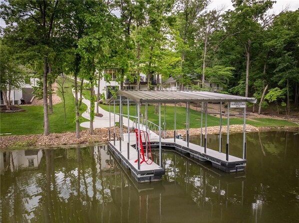 Private dock with its own beach.  Walk right in the water and float around.  