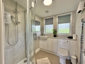 Shower Room with heated tail rail and wall heater