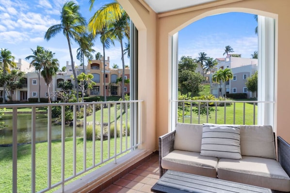 Experience the ultimate in relaxation with this stunning balcony setting, featuring a comfortable couch that invites you to unwind while enjoying breathtaking ocean views. Perfect for morning coffee or evening sunsets, this serene outdoor space combines s