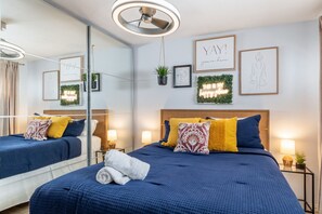 Queen size bed with large closets!