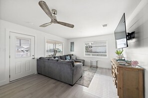 Curl up with a good book in the inviting living room