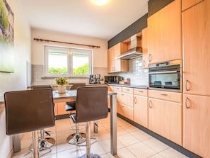 Kitchen, Furniture, Interior Design, Cabinetry, Countertop, Kitchen Appliance, Flooring, Major Appliance, Drawer, Home