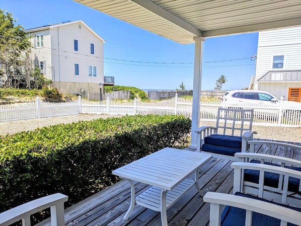 The front deck affords a partial view of the bay.