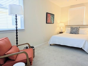 The secondary bedroom is spacious and relaxing.
