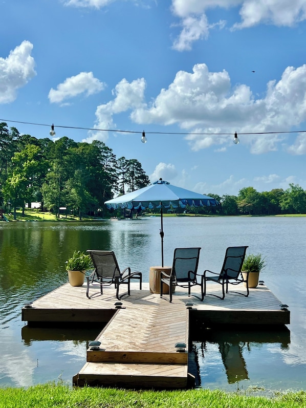 Pier and sun loungers for relaxing or fishing.