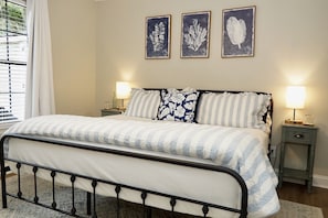 King bed wrapped in luxury linens
