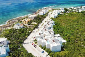Experience awe-inspiring views from above! Our coastal sanctuary, nestled along the Caribbean Sea, provides a mesmerizing aerial perspective of paradise.
