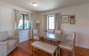 Natural light and wood tones create a homely dining experience