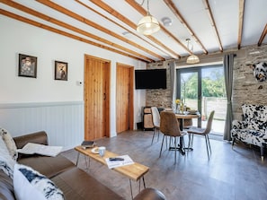 Living room/dining room | The Old Cowsheds 4 - Daniel Ddu - Gaer Cottages, Cribyn, Lampeter