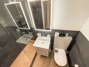 Flooring, Floor, Interior Design, Plumbing Fixture, Bathroom, Bathroom Sink, Bathroom Cabinet, Toilet, Sink, Plumbing