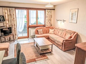 Furniture, Interior Design, Couch, Wood, Floor, Room, Flooring, Living Room, Apartment, Lighting