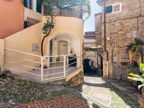 Stairs, Flowerpot, Houseplant, Balcony, Flagstone, Alley, Handrail, Walkway, Cobblestone, Hacienda