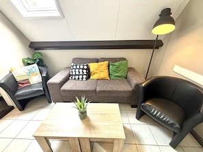 Furniture, Interior Design, Flooring, Floor, Room, Couch, Living Room, Apartment, Chair, Home