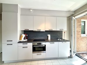 Kitchen, Kitchen Appliance, Countertop, Cabinetry, Major Appliance, Interior Design, Flooring, Furniture, Home Appliance, Kitchen Sink
