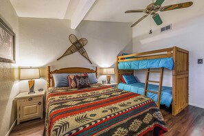 Bedroom 1 has a queen bed and 2 bunk beds.