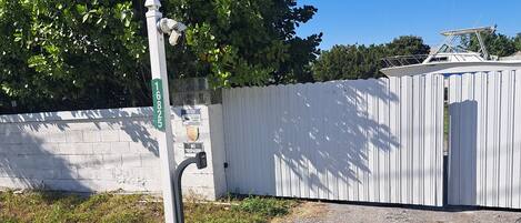 gated with key pad and security caneras