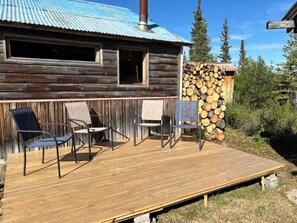 Deck and outdoor furniture for relaxation.