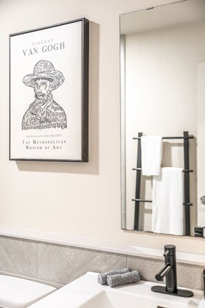 Modern bathroom finishes complement the loft’s industrial heritage—combining restored 1903 architecture with comfort for Stratford Airbnb stays.