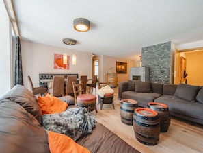 Furniture, Interior Design, Wood, Ceiling, Couch, Lighting, Living Room, Table, Room, Flooring