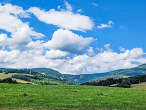 Sky, Cloud, Blue, Daytime, Green, Grass, Mountainous Landforms, Natural Environment, Nature, Cumulus