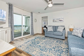 Kick back in a cozy, coastal living room made for relaxation.