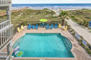 Dive into vacation mode in the sparkling outdoor pool—just steps from your door.

