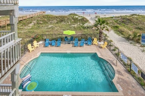 Dive into vacation mode in the sparkling outdoor pool—just steps from your door.