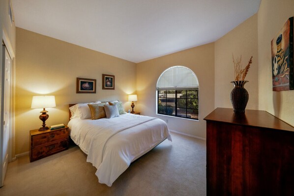 Bedroom 2 with a cozy queen bed and closet