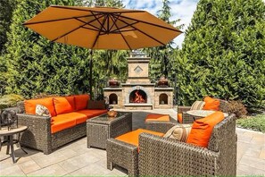 Enjoy cool nights around the outdoor fireplace